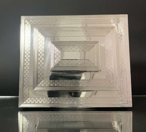 An unusual Art Deco triple tier cigar box by Mappin & Webb