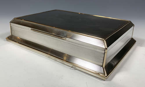An Asprey silver and gold cigar box
