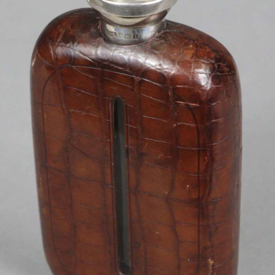 An unusual sterling silver and Crocodile skin hip flask