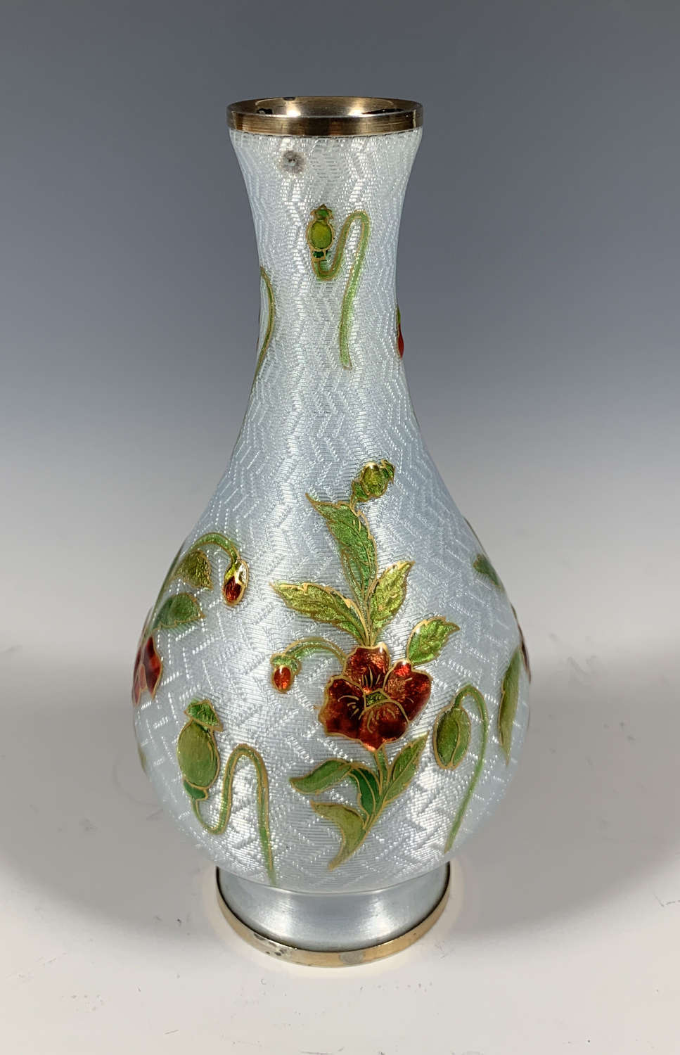 A sterling silver and enamel bud vase, circa 1920