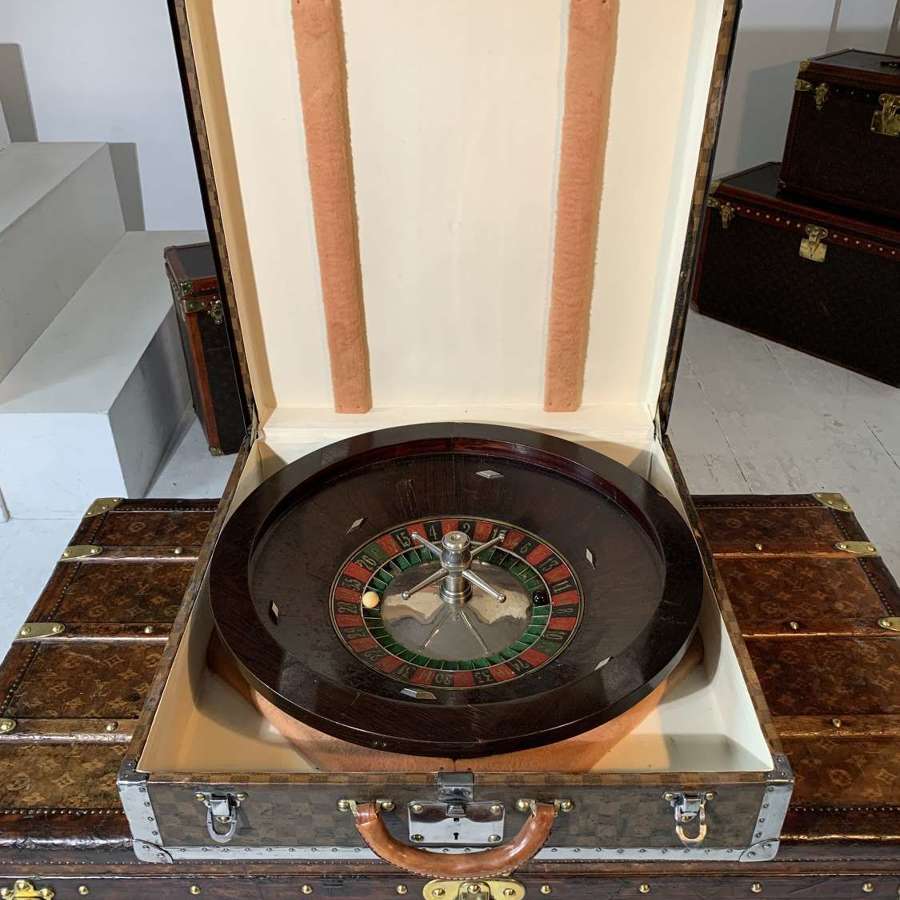 A very rare Louis Vuitton travelling roulette case and wheel