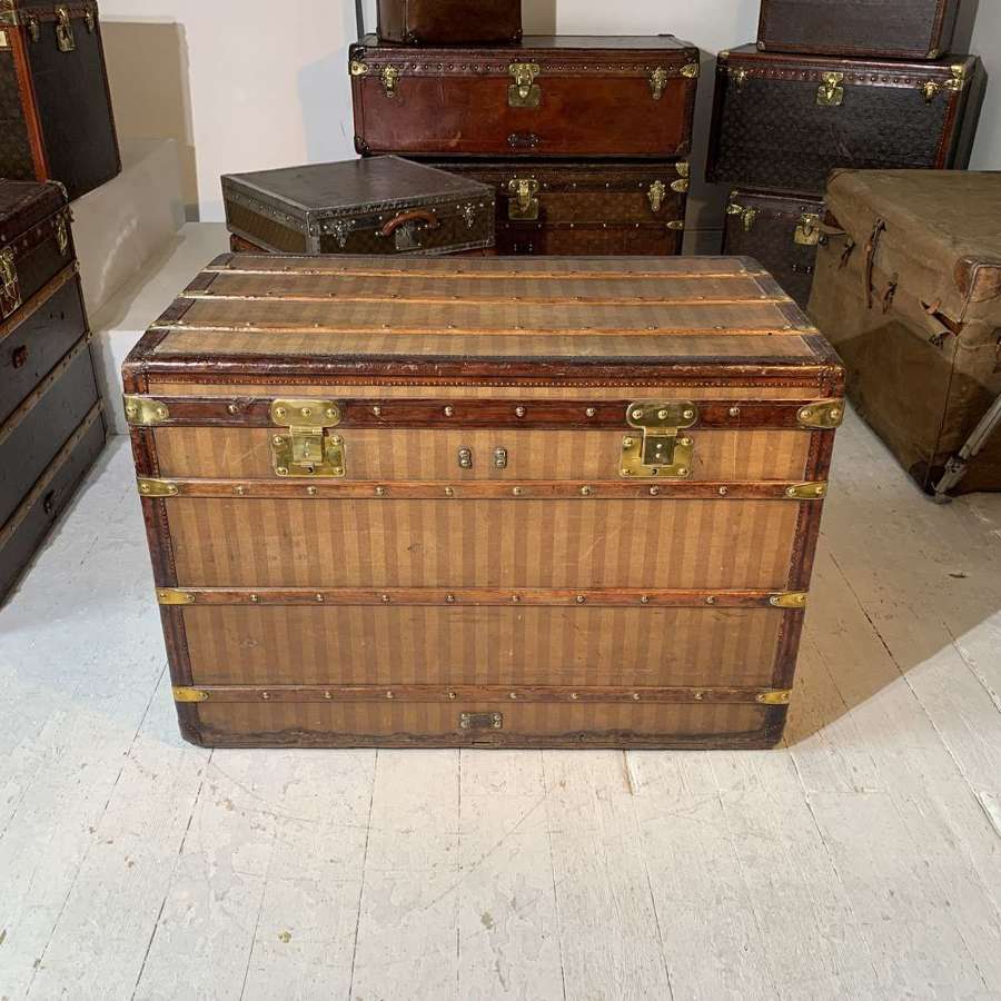 A large Louis Vuitton Rayee fabric Malle Courier trunk circa 1885