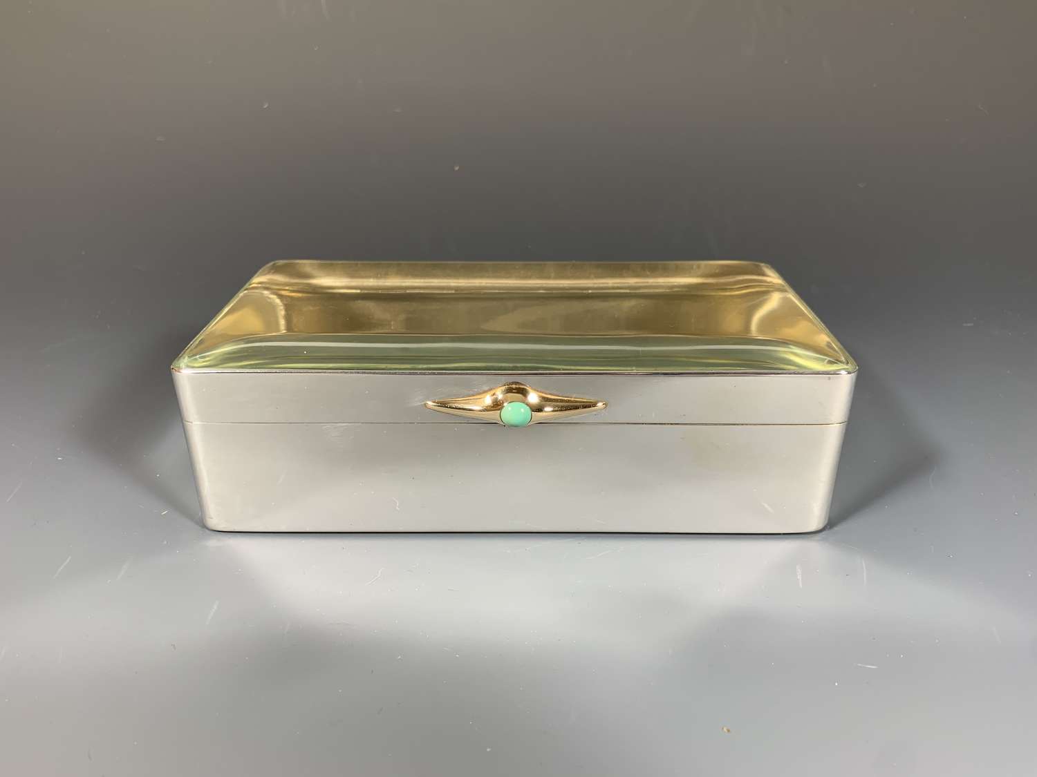 A silver and crystal cigar box, with an 18ct gold & turquoise caboch