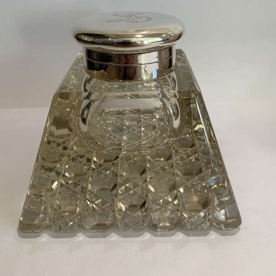 A pyramid style silver inkwell with hobnail cut glass