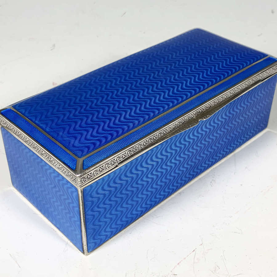 An exceptional Silver & Guilloche enamel cigar box