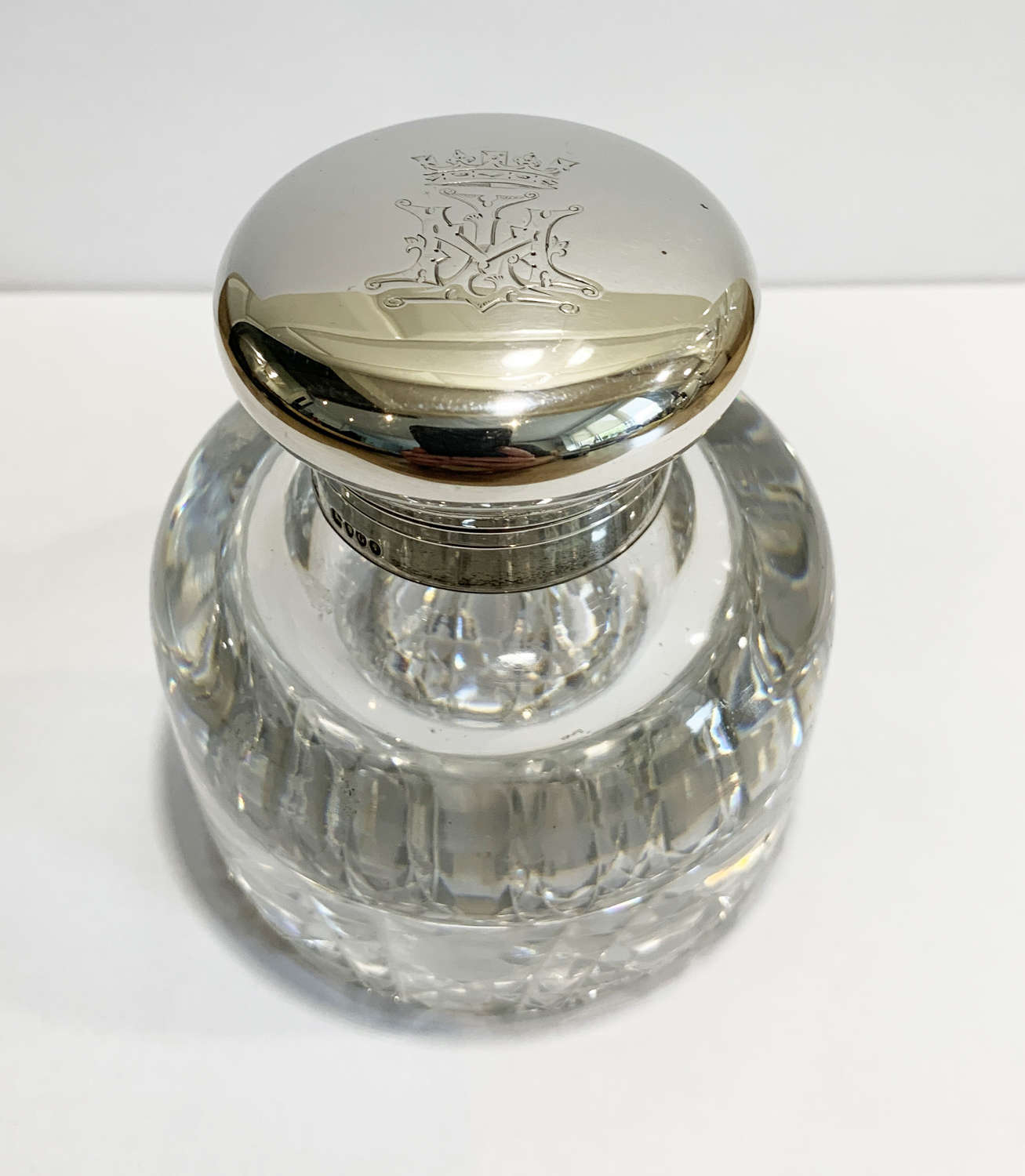 A silver and glass inkwell formerly owned by Princess Louise