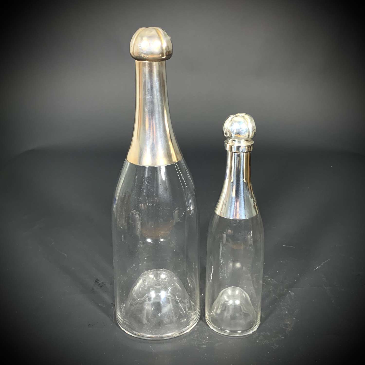 A sterling silver and glass Magnum Champagne bottle, 1898