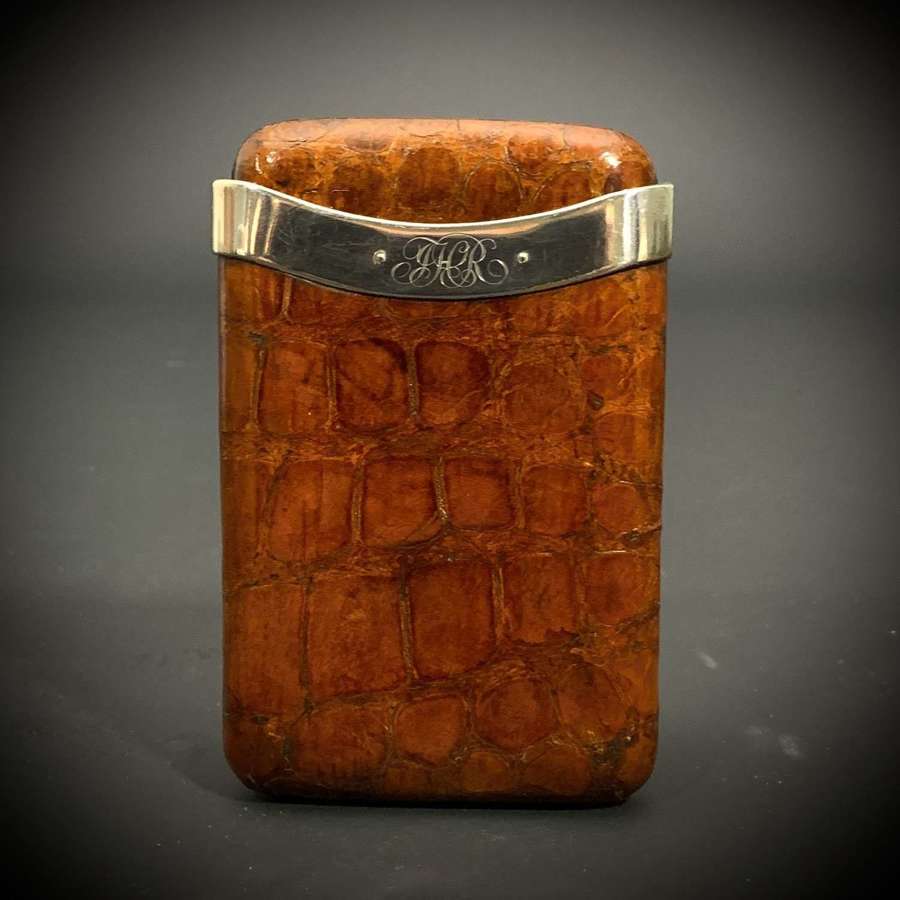 A silver mounted crocodile skin cigar wallet dated for London 1901