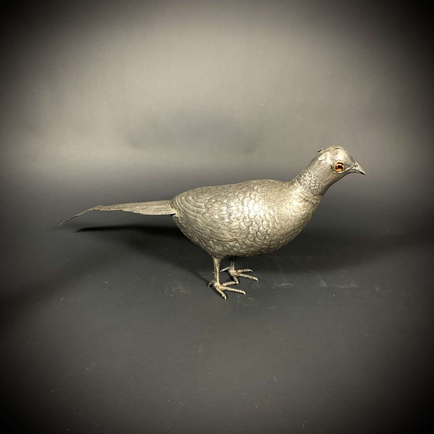 An Art Deco silver Pheasant sifter. Dutch, dated for 1920.