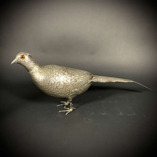 An Art Deco silver Pheasant sifter. Dutch, dated for 1920.
