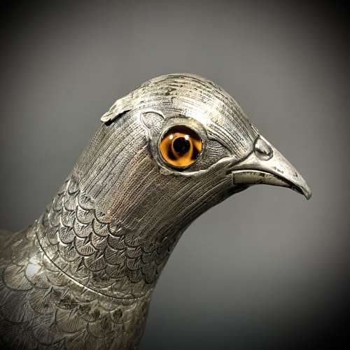An Art Deco silver Pheasant sifter. Dutch, dated for 1920.