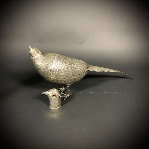 An Art Deco silver Pheasant sifter. Dutch, dated for 1920.