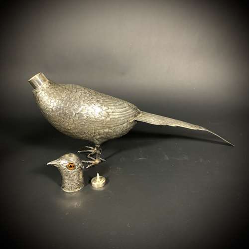An Art Deco silver Pheasant sifter. Dutch, dated for 1920.