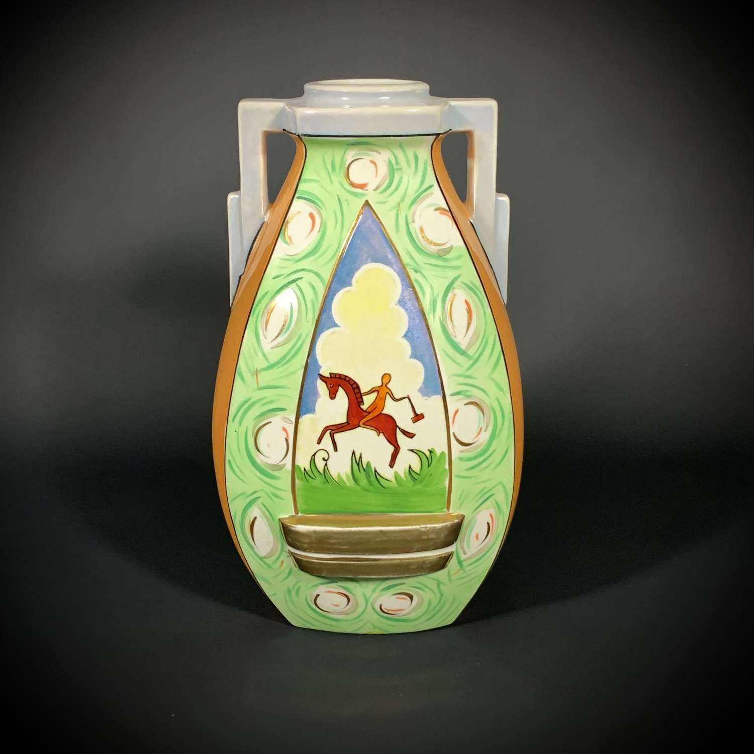 An Art Deco Japanese lusterware Polo themed vase