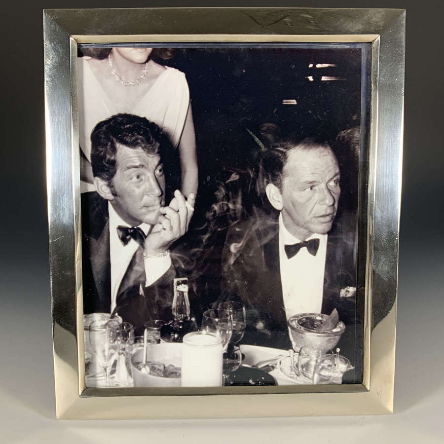 A large sterling silver photograph frame by William Comyns
