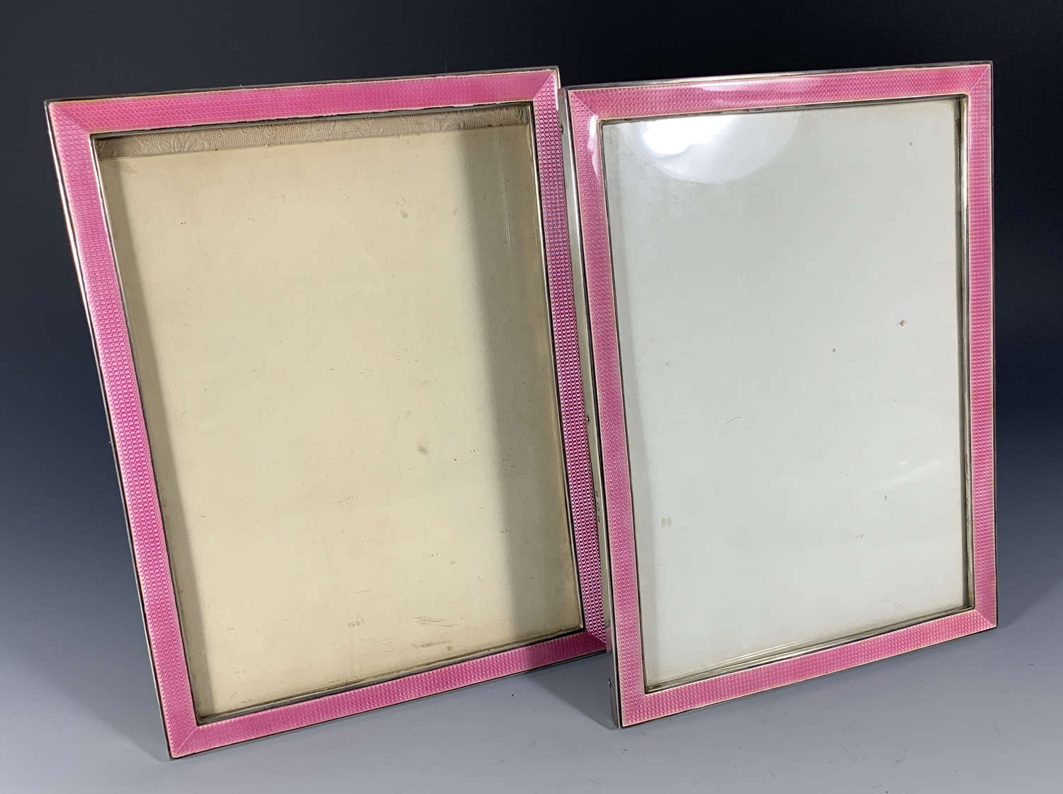 A large pair of Art Deco silver & pink guilloche enamel frames