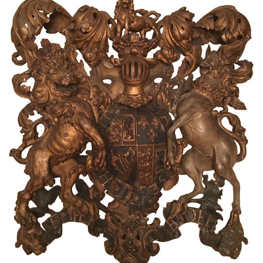 An incredibly rare Queen Anne, hand carved wooden Royal Arms Circa 170