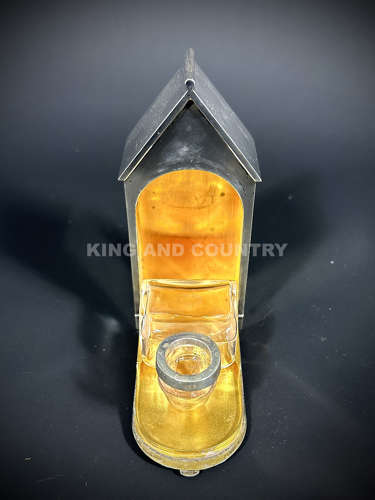 A Edwardian inkwell fashioned as a Sentry Hut with Guard