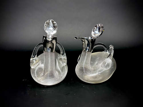 A rare pair of Victorian Duck claret Jugs