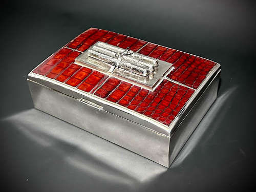 An Art Deco silver and crocodile skin cigar box