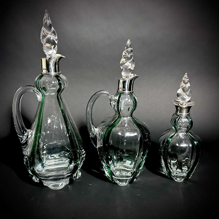 A set of 3 Art Nouveau Stuart Glass Claret jugs by Heath & Middleton