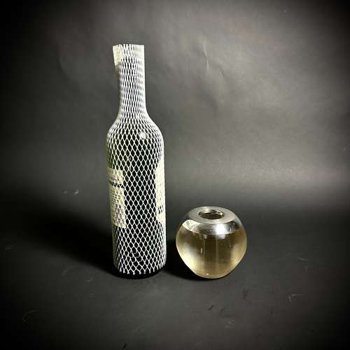 A selection of large silver and glass match strikers